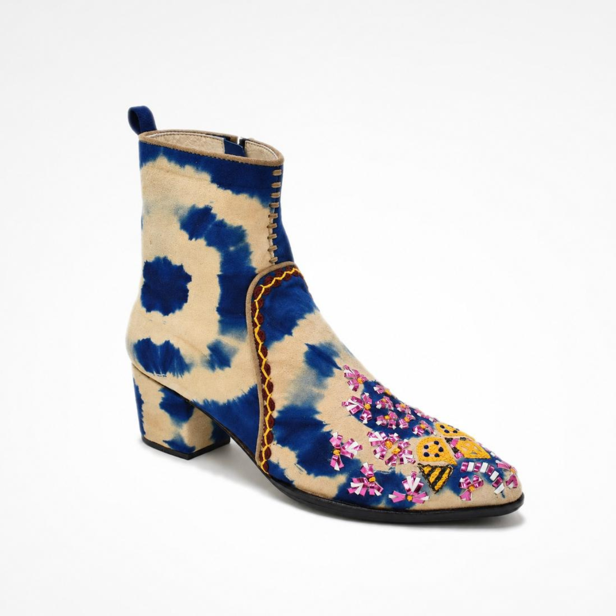 Angled view of the blue-and-beige tie-dye suede MANI Point Heeled Boot with colourful embroidered pointed toe