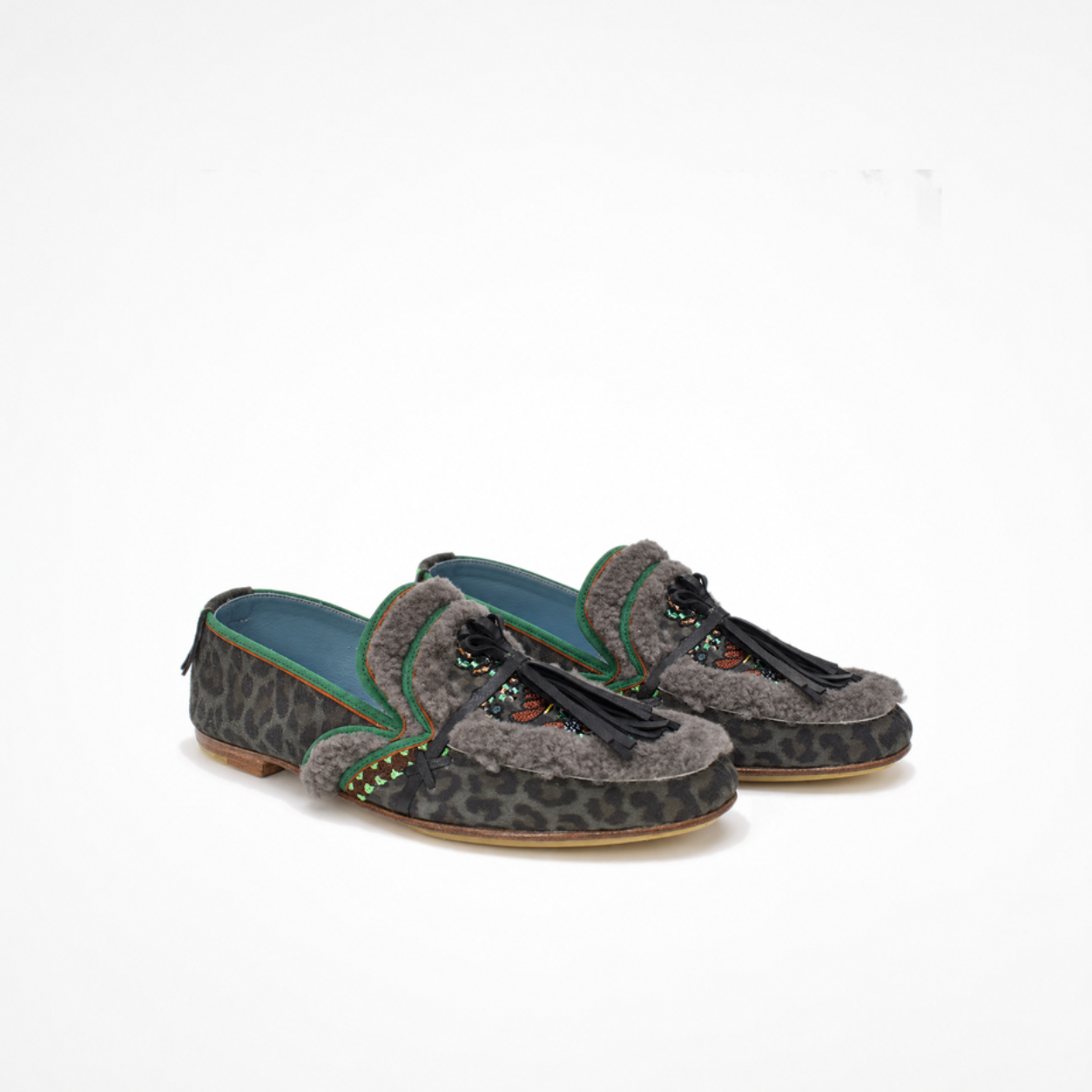 Pair of grey leopard-print Oud loafers with embroidered tongues, black tassels and faux-shearling trim