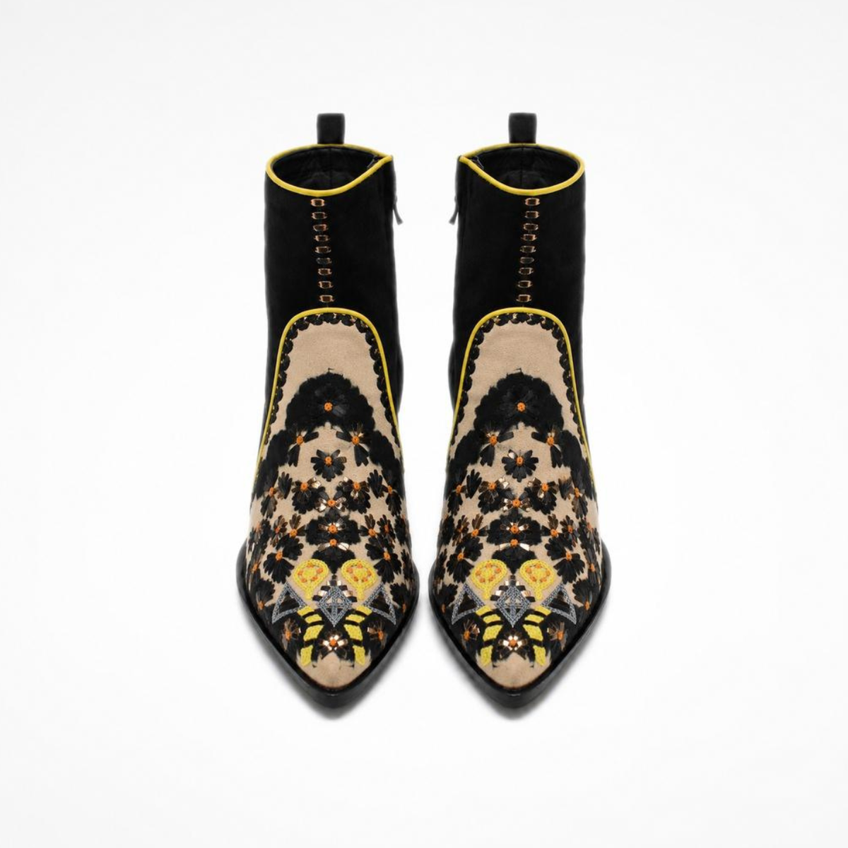Front view of a pair of black suede MANI Point Heeled Boots with black-and-beige tie-dye embroidered fronts