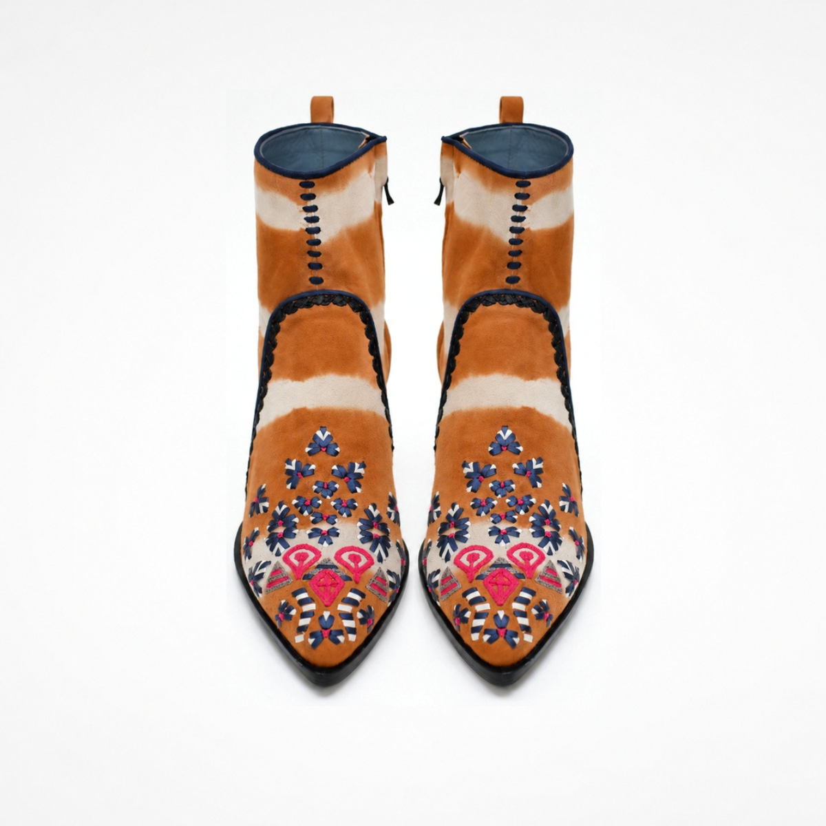 Front view of a pair of orange-and-cream tie-dye suede MANI Point Heeled Boots with embroidered pointed toes