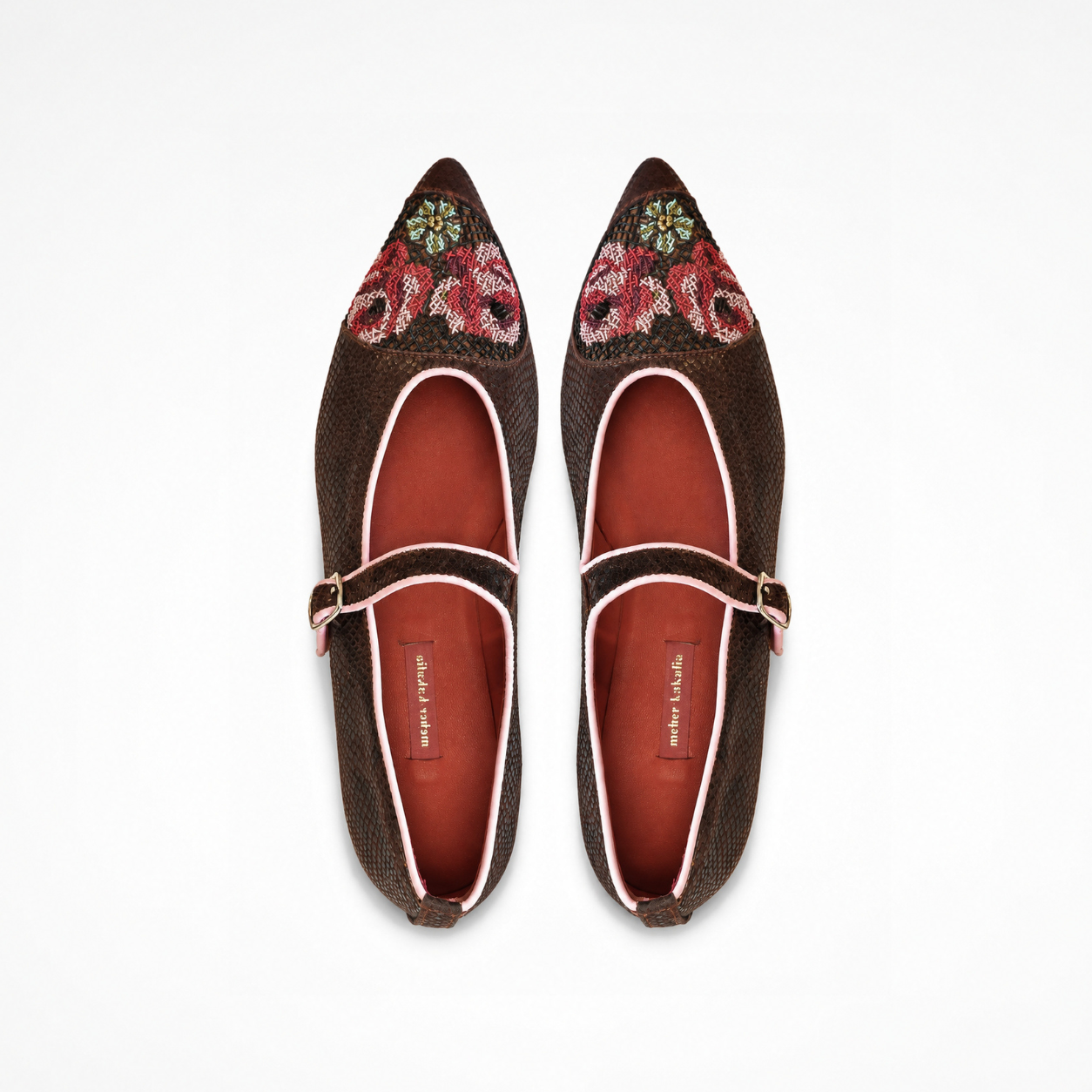 Pair of chocolate-brown textured leather Nora Point Mary Jane flats with red-and-pink roses, pointed toes and buckle straps