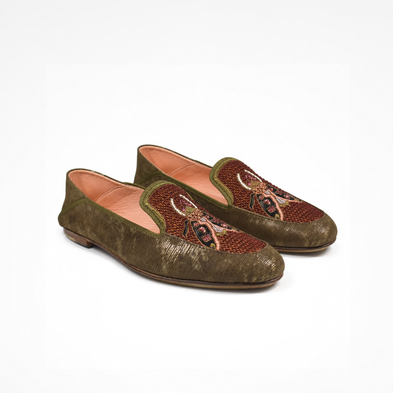 Angled view of a pair of olive-brown textured leather SELENE Loafers with hand-embroidered beetle motifs