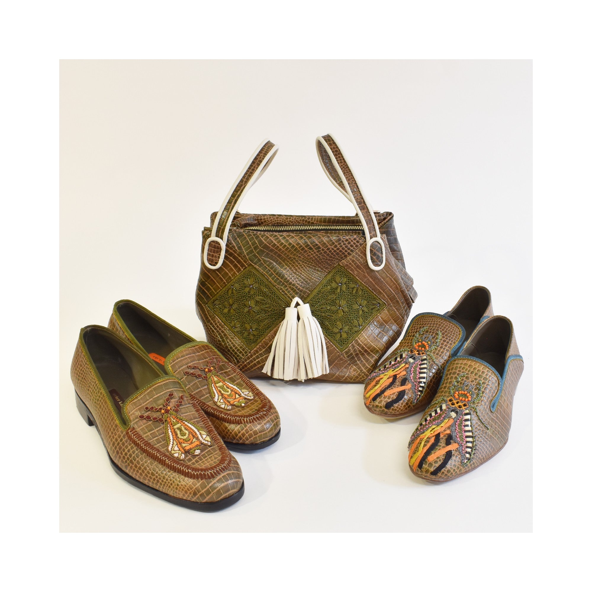 Meher Kakalia Bunny Bag in croc camouflage army leather paired with coordinating embroidered moccasins.