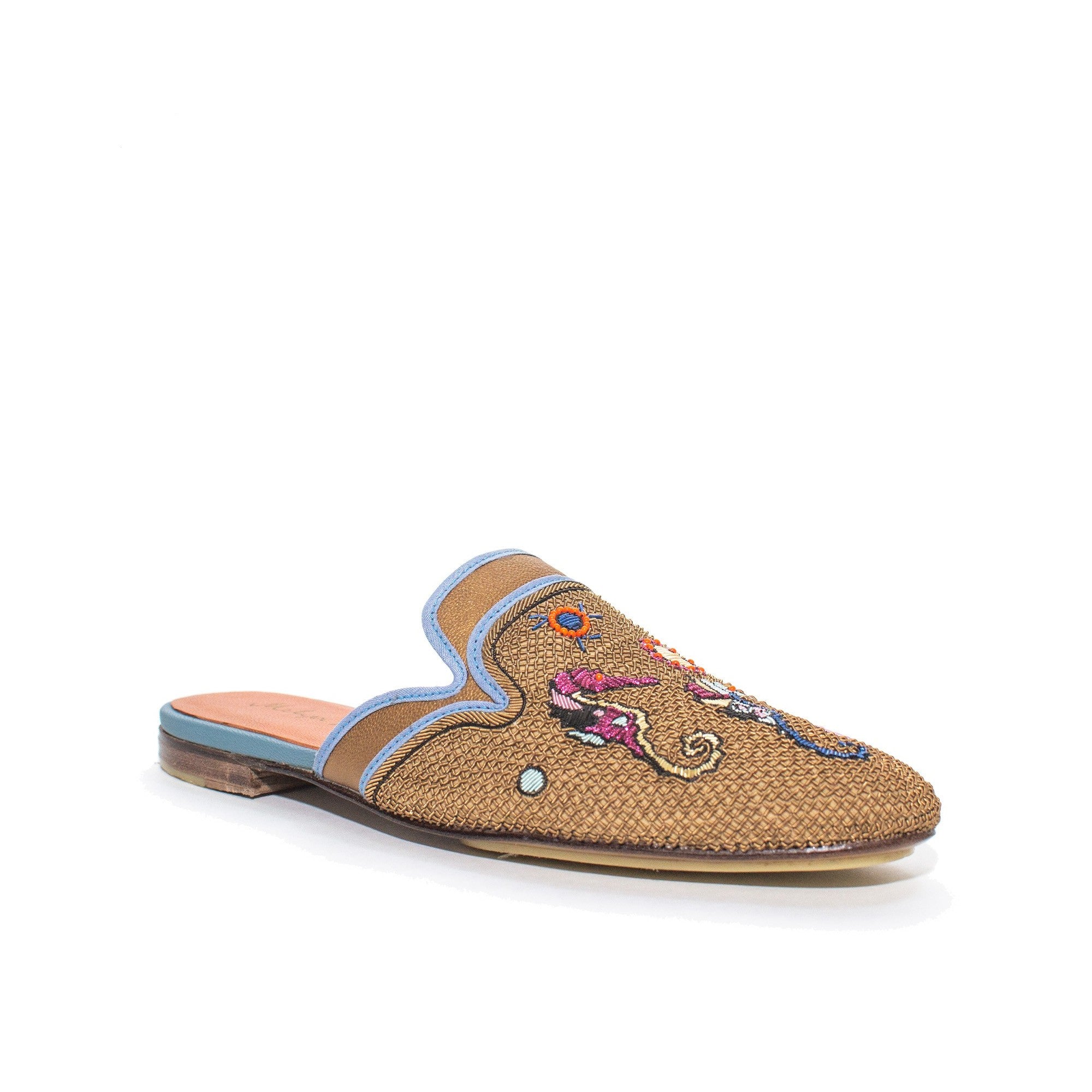 Stylish hand-embroidered slippers with marine designs, great for beach vacations.
