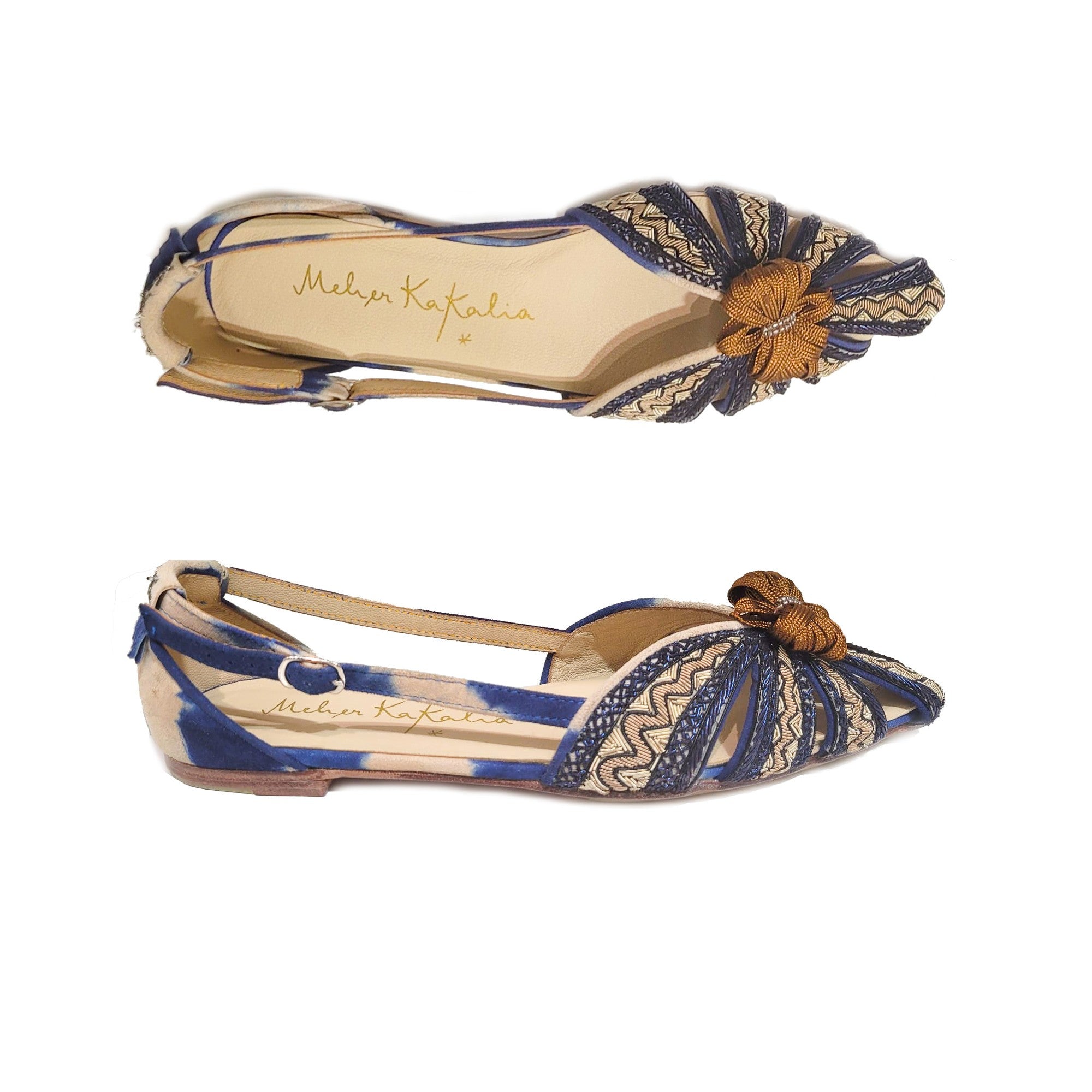 Beige navy embroidered slingback flat with intricate detailing, perfect for a summer garden party or a day out with friends.