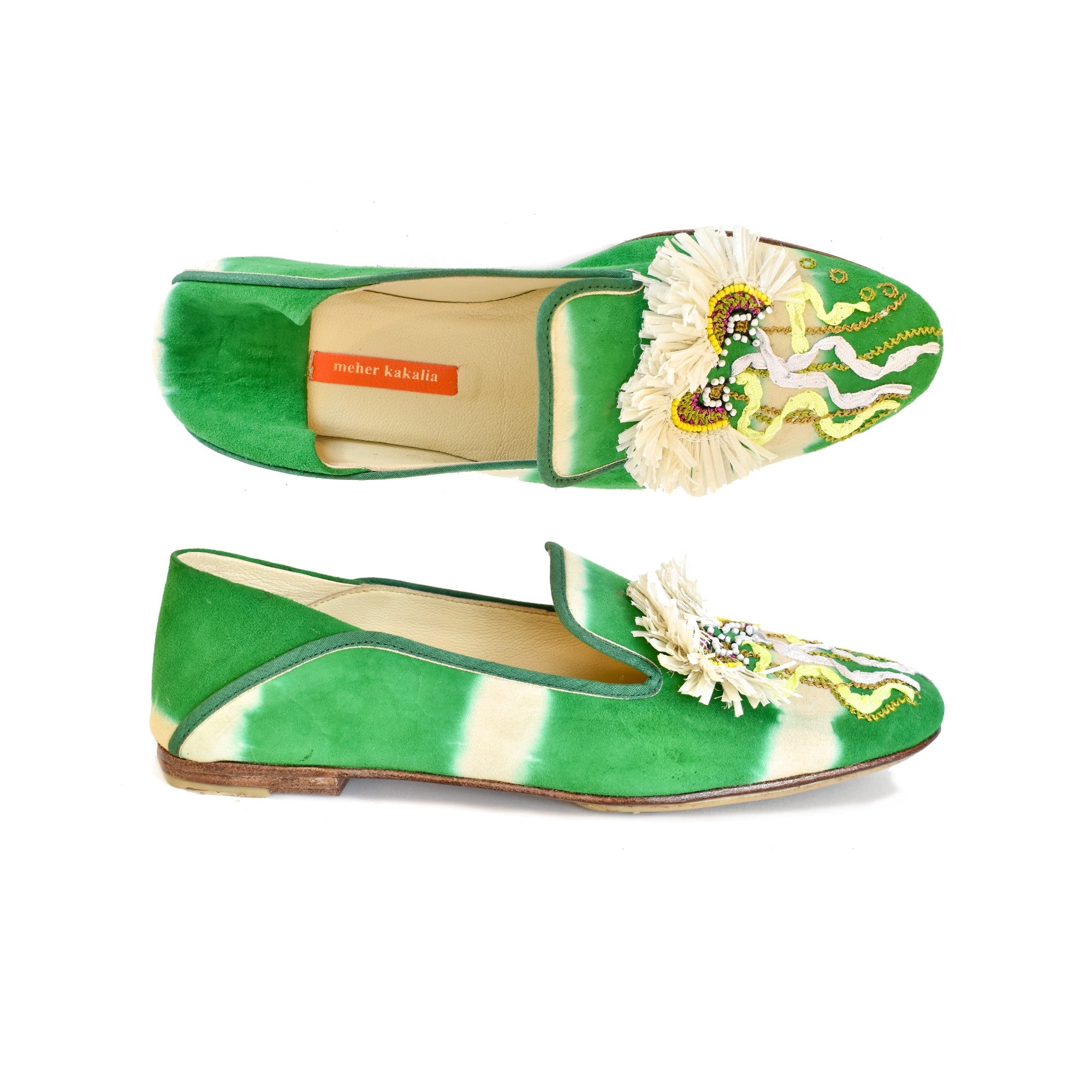 Meher Kakalia RIO Moccasin in Kelly Green, handcrafted with eco-friendly Raffia and vibrant tie-dye leather.