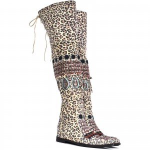Statement over-the-knee boots in leopard leather with hidden wedge heel and artisan detail