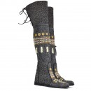 Meher KakaliaStatement over-knee leopard boots featuring hand embroidery, leather embellishments, and adjustable lace-up back.