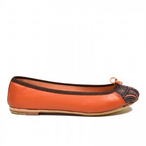 Side view of orange Meher Kakalia ballet flat with coral thread details