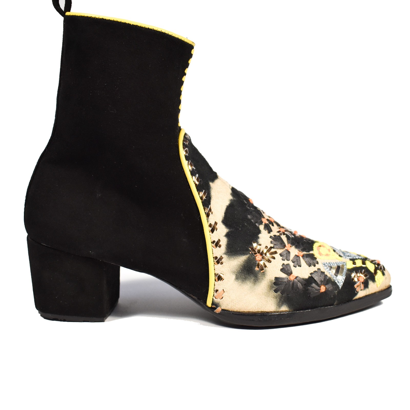 Side view of Mani Point Heel in black suede with tie-dye beige front and yellow piping