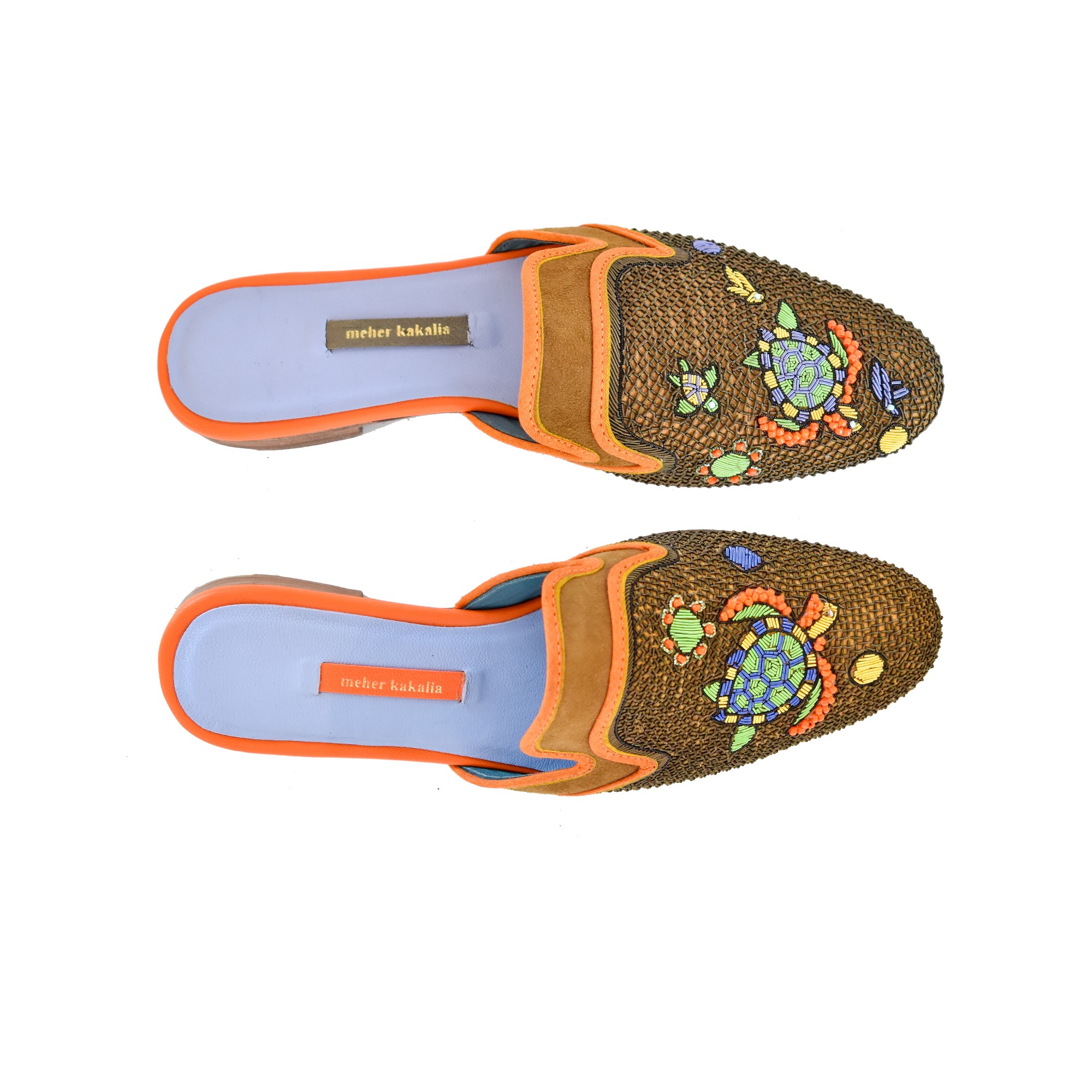 Meher Kakalia These handmade Darwin Slippers are embroidered with eco leather and turtle motifs. Perfect for sustainable summer holidays.