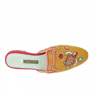 Darwin Slippers by Meher Kakalia, hand embroidered with eco leather and turtle design. Elegant, sustainable resort slides.