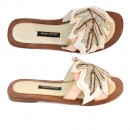 Meher KakaliaHandmade Palm Gobi Slide white with intricate palm leaf embroidery. Elegant resort footwear for summer vacations.
