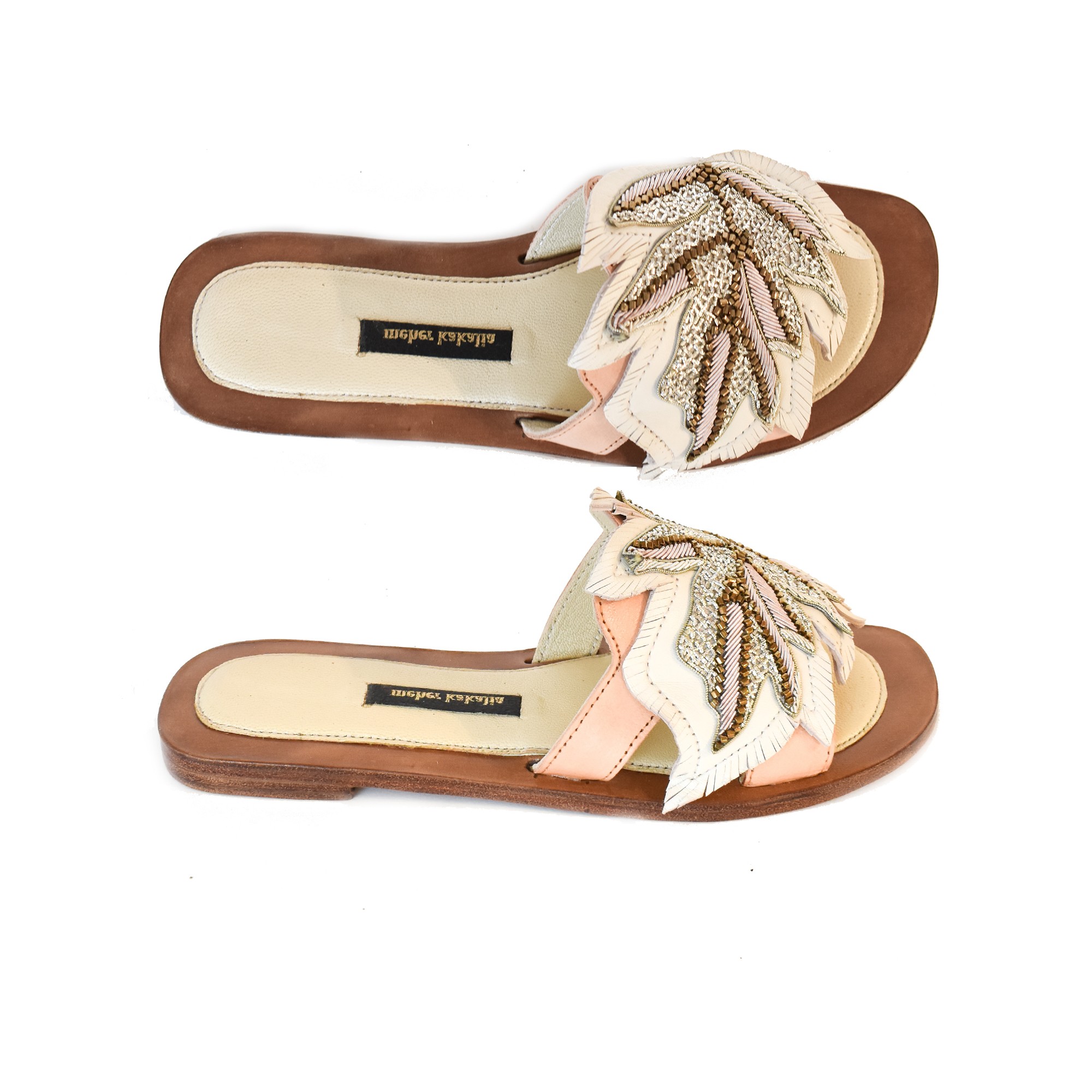 Meher Kakalia Handmade Palm Gobi Slide white with intricate palm leaf embroidery. Elegant resort footwear for summer vacations.