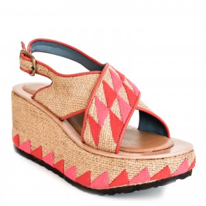 Side view of jute platform wedge with bold pink-red pattern and leather-lined insole.