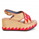 Meher KakaliaWoven jute wedge sandal with coral and pink geometric embroidery and ankle strap.