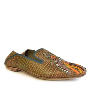 Three-quarter view of Meher Kakalia Luna Moccasin in camouflage tones with bead and ribbon embellishment.