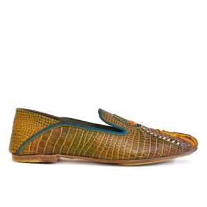 Profile view of Meher Kakalia Luna Moccasin highlighting hand-stitched embroidery on croc leather.