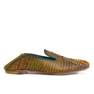 Side view of Meher Kakalia Luna Moccasin showing symmetrical embroidered insect motif on croc-embossed leather.