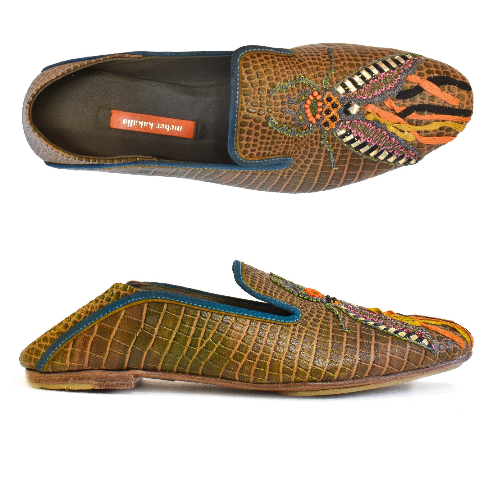 Top view of Meher Kakalia Luna Moccasin in croc camouflage leather with hand embroidery and metallic detailing.