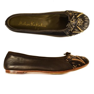 Meher Kakalia home Black ballet flats by Meher Kakalia with black and gold embroidery and black trim.