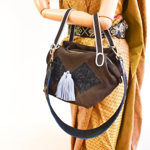Nubuck brown Meher Kakalia Bunny Bag with embroidered panels and rope-blue detachable strap.
