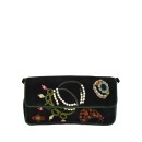 Meher KakaliaMeher Kakalia Jewel Clutch in black with hand embroidery and pearl accents.