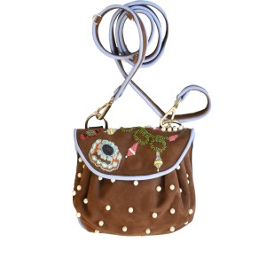 Jewel Accordion Bag in suede toffee with hand embroidery, shown with rolled adjustable strap.