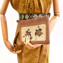 Meher KakaliaEmbroidered copper peach leather pochette from Meher Kakalia limited edition