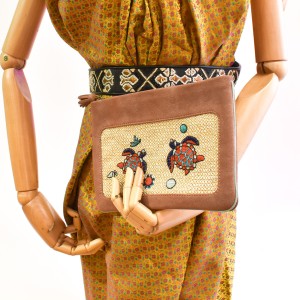 Embroidered copper peach leather pochette from Meher Kakalia limited edition