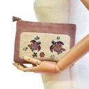 Meher KakaliaFront view of copper peach Darwin Pochette with hand embroidery