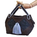 Meher KakaliaNubuck brown Meher Kakalia Bunny Bag with embroidered panels and rope-blue detachable strap.