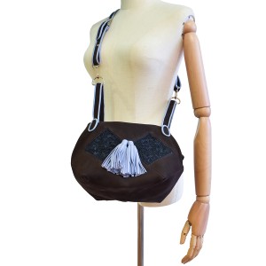 Nubuck brown Meher Kakalia Bunny Bag with embroidered panels and rope-blue detachable strap.