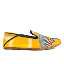 Meher KakaliaSide view of ANZU Moccasin TD saffron in yellow tie-dye suede leather with navy trim and embroidered vamp motif