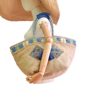 Natural jute basket bag with hand-embroidered elephant panels