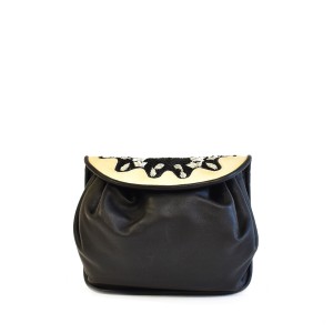 Meher Kakalia home Small accordion-style leather bag in black and white with detachable strap.