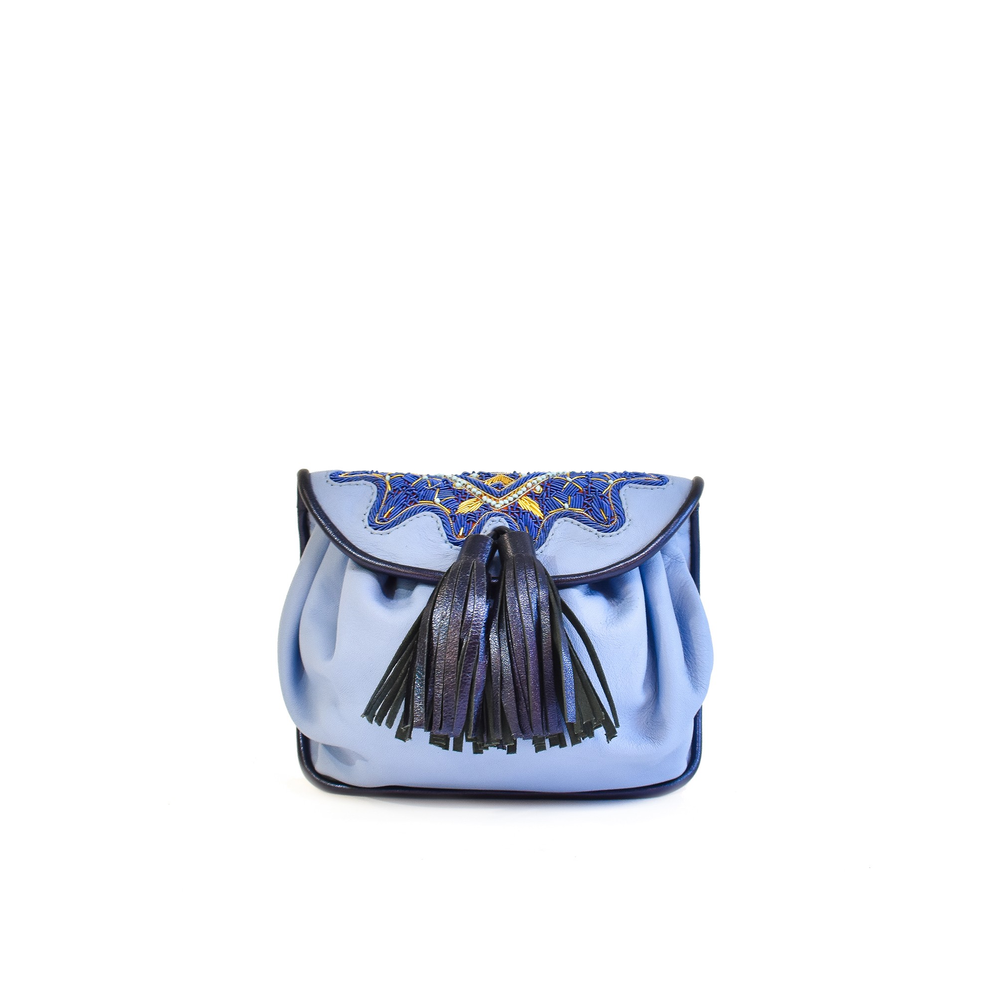 Meher Kakalia Small blue leather shoulder bag with adjustable strap and tassel detail.