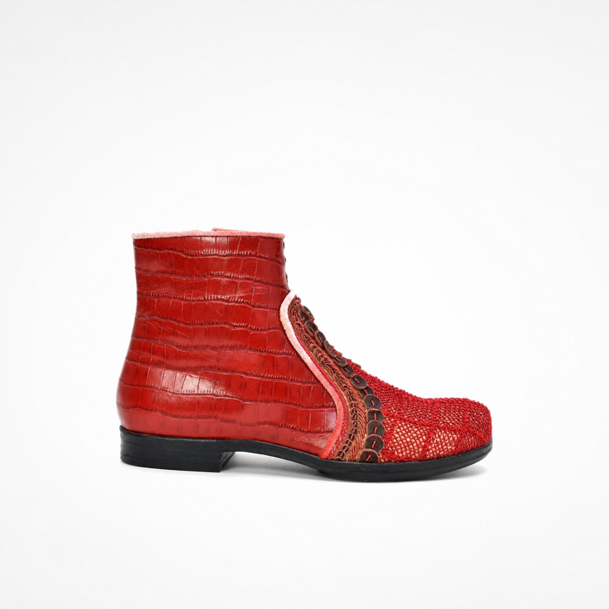 Side view of red croc-effect leather Queen Neva boot with low black heel and embroidered red front panel