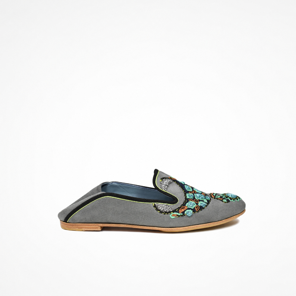 Side view of the grey suede VITI Loafer with the heel folded down as a babouche-style slipper