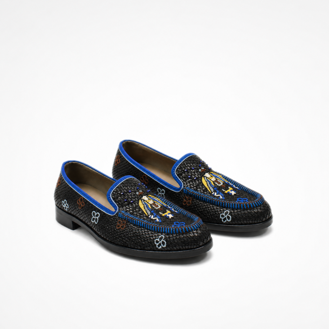 Pair of black textured leather Rati Loafers with blue piping, multicolour embroidery and low-profile soles