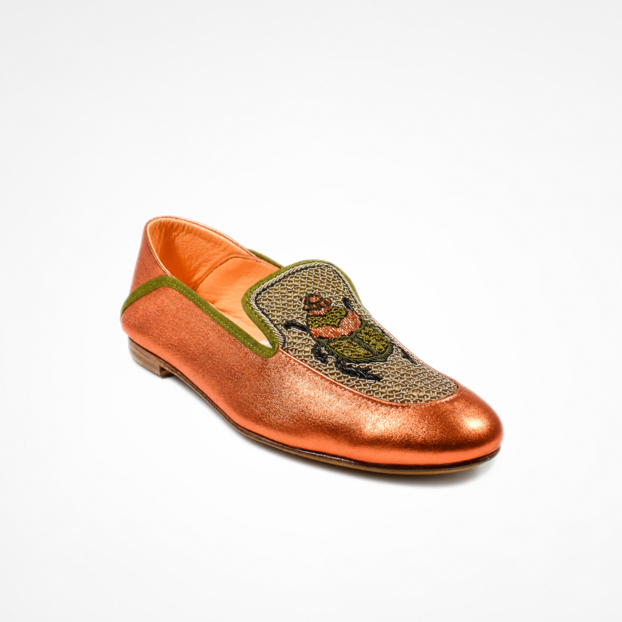 Metallic orange leather Scarab Loafer with an embroidered scarab motif, olive piping and rounded toe