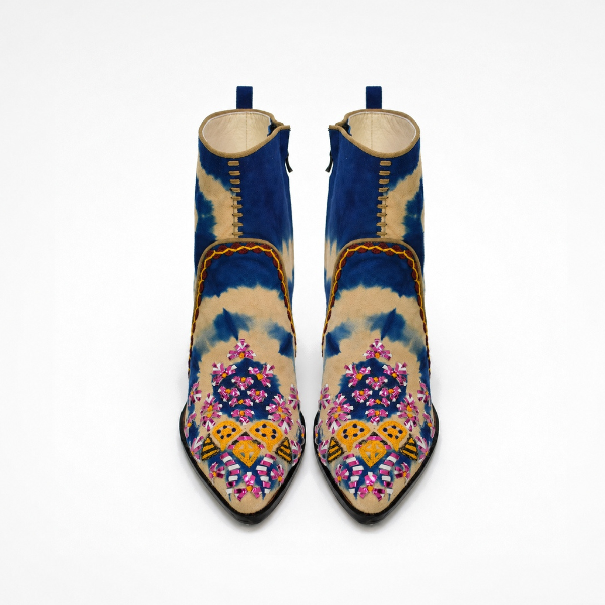 Front view of a pair of blue-and-beige tie-dye suede MANI Point Heeled Boots with colourful hand embroidery