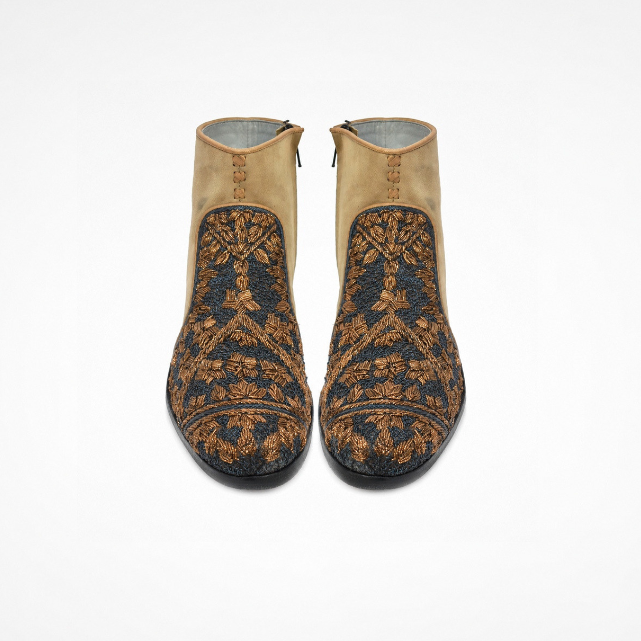  Pair of camel-beige suede Queen Neva boots with symmetrical navy-and-bronze floral embroidery