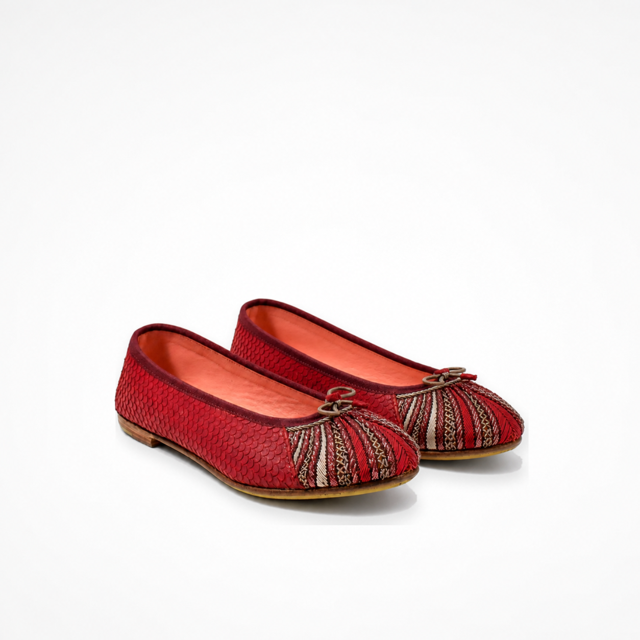 Pair of cranberry-red textured leather Miami ballet flats with embroidered toe panels and rounded toes