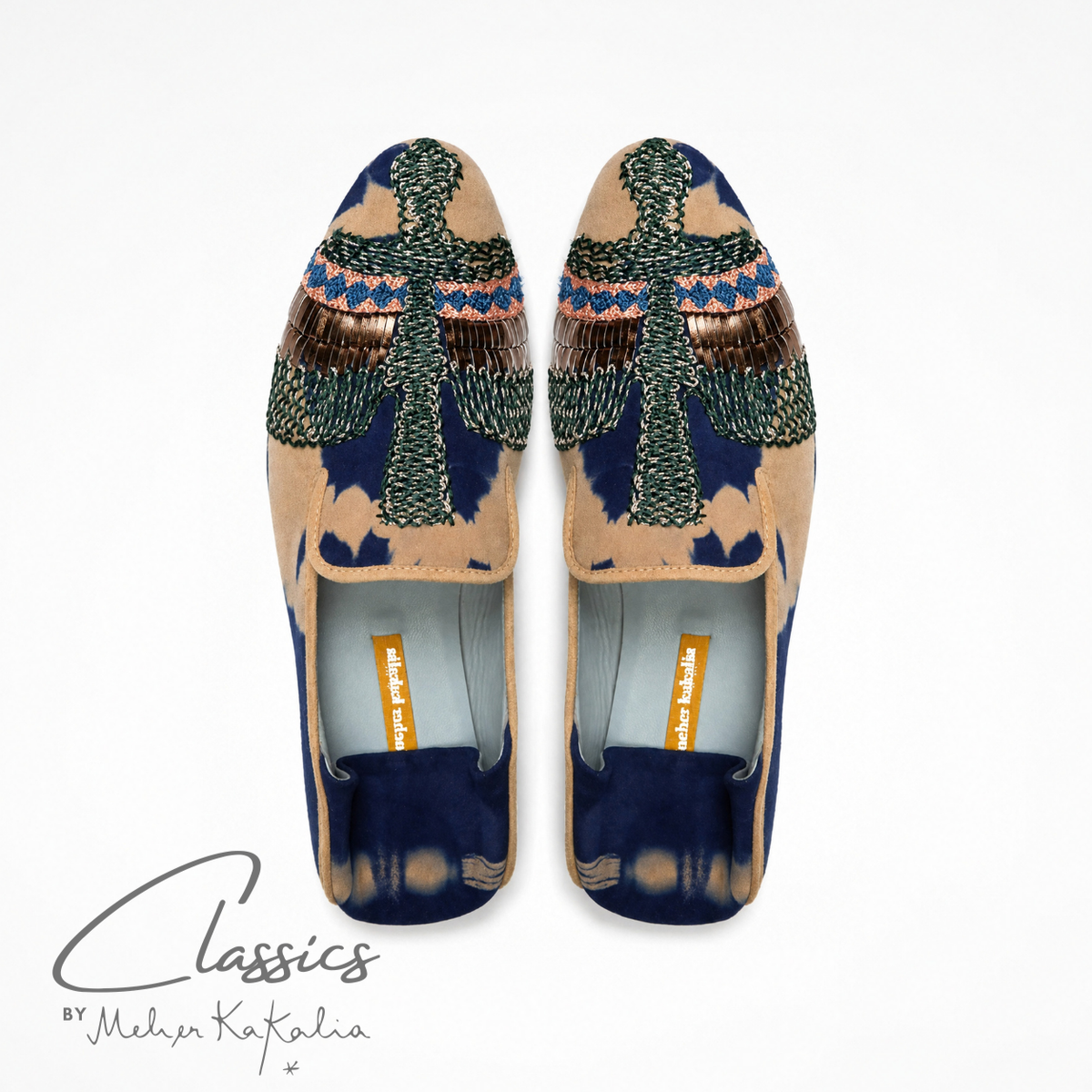 Pair of blue and beige tie-dye suede ANZU loafers with hand embroidery, top view