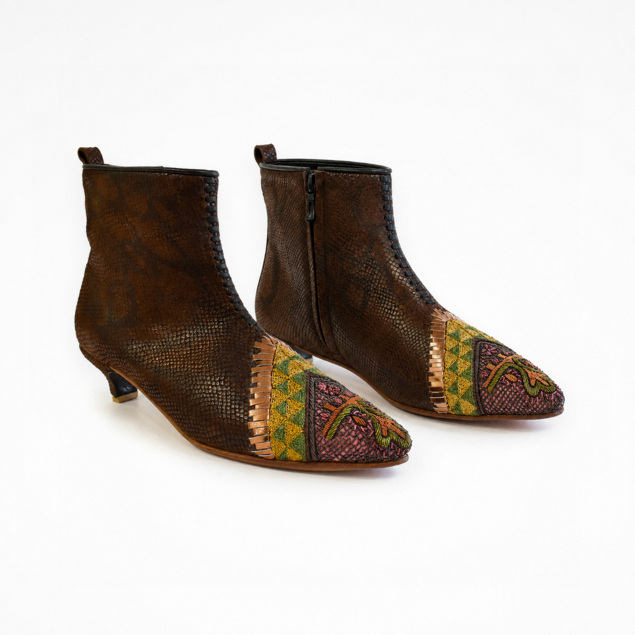Pair of brown textured leather Astrid heeled boots with pointed embroidered toes, side zips and low kitten heels