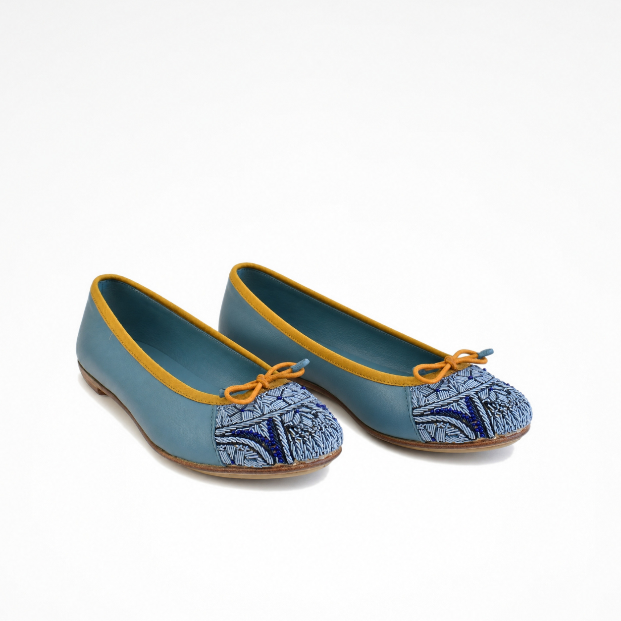 Pair of Bizi Ballet Classic flats in shadow blue leather with blue embroidered toe panels and contrasting ochre trim