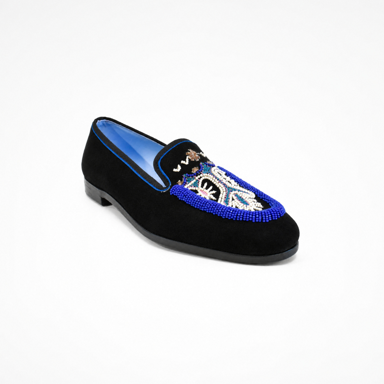 Black suede loafer with blue and white beadwork, embroidered vamp and rounded toe