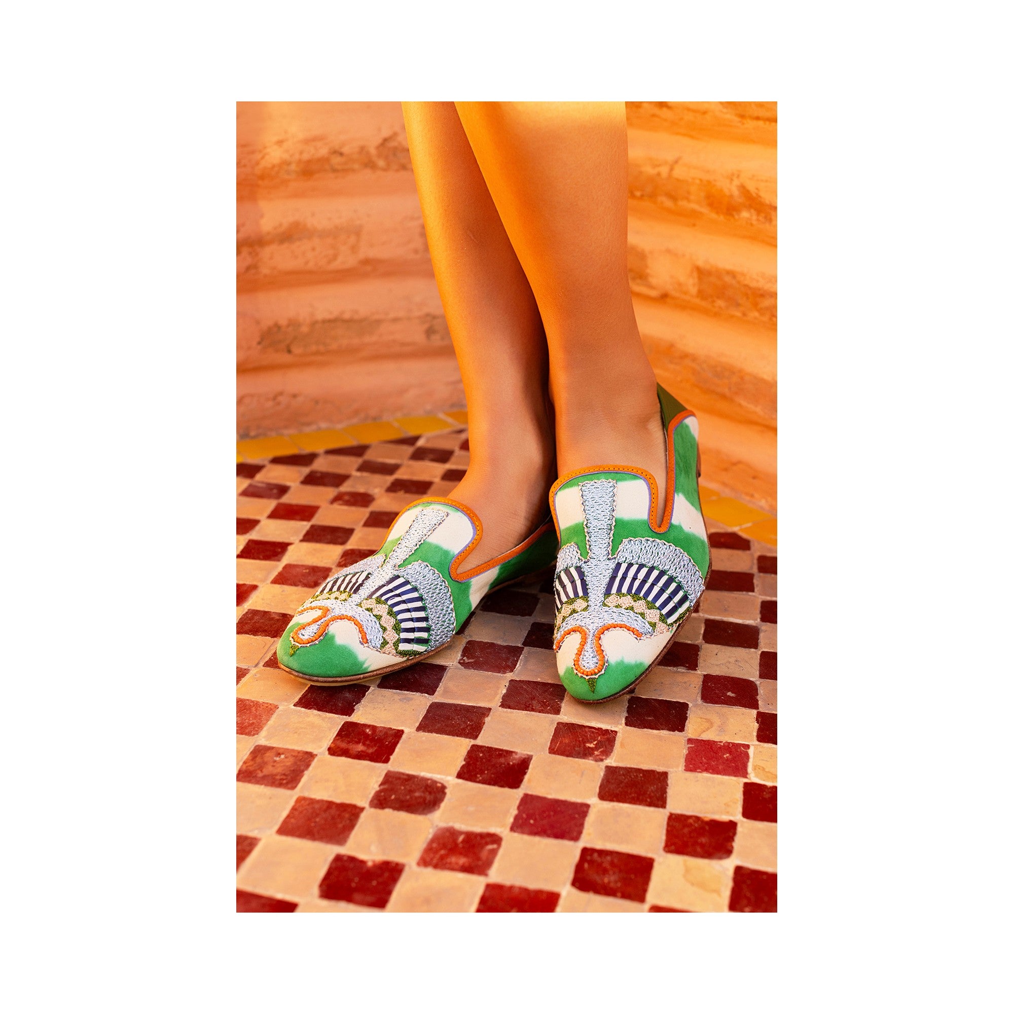 Handmade Kelly Green moccasins by Meher Kakalia, featuring vibrant tie-dye suede and detailed embroidery for a unique look.