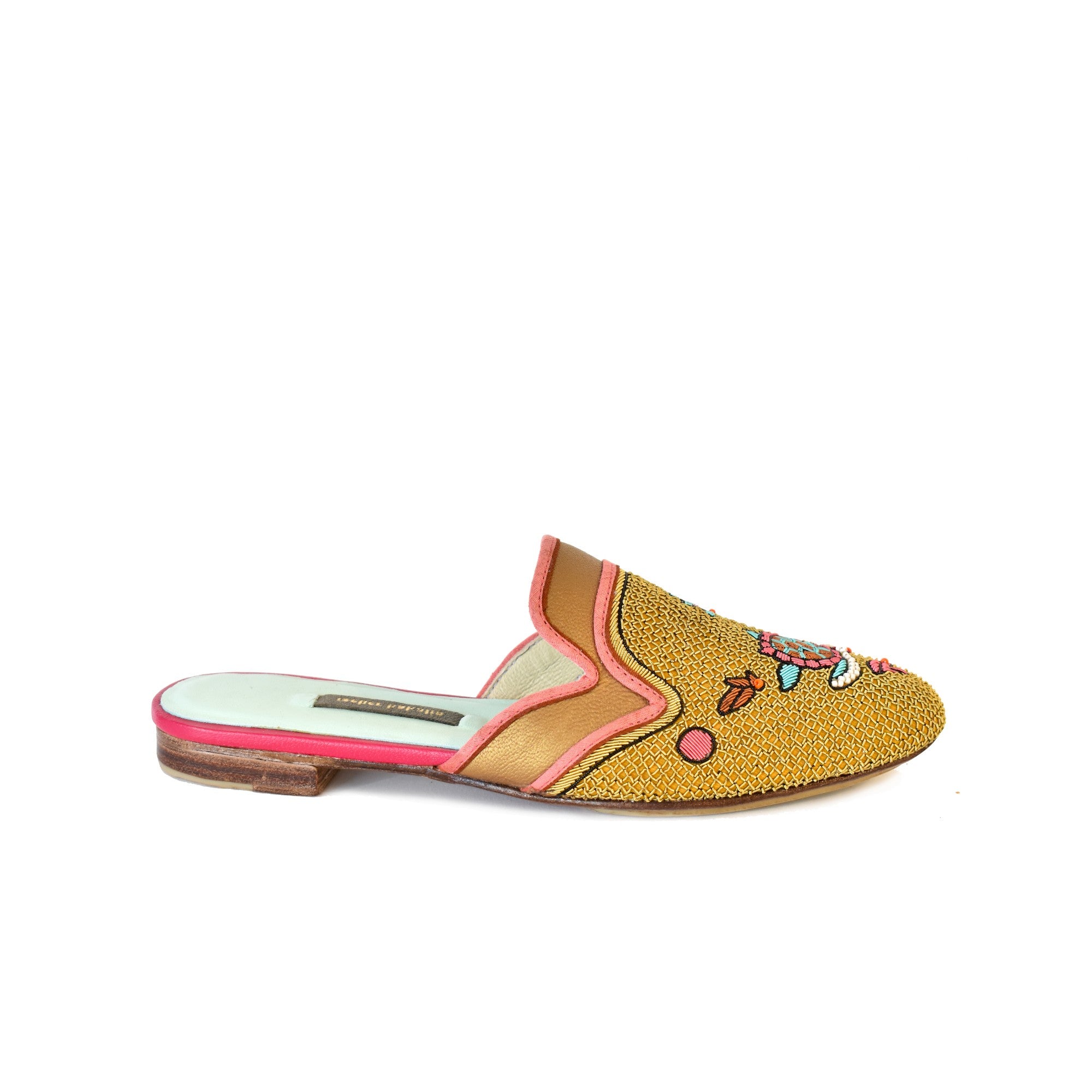 Hand embroidered eco leather slides with turtle design. Sustainable luxury, perfect for your next resort getaway.